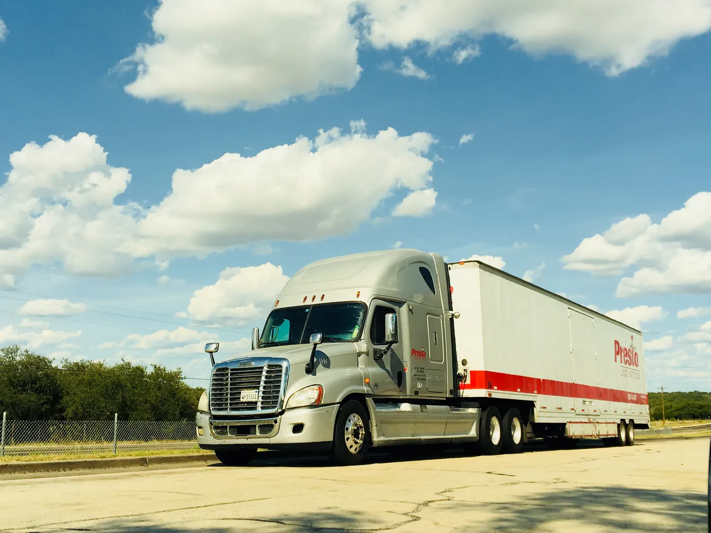 Presto Logistics tractor-trailer parked and ready